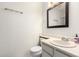 Clean bathroom with a white vanity, mirror, and essential fixtures at 7977 W Wacker Rd # 171, Peoria, AZ 85381