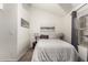 Bright bedroom featuring a bed, neutral decor, and natural light from a window at 7977 W Wacker Rd # 171, Peoria, AZ 85381