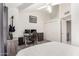 Cozy bedroom with a desk, ceiling fan, closet, and neutral color scheme at 7977 W Wacker Rd # 171, Peoria, AZ 85381