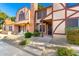 Well-maintained two-story townhome boasting brick accents, landscaping, and inviting curb appeal at 7977 W Wacker Rd # 171, Peoria, AZ 85381