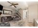 Comfortable living room with a large sectional sofa and staircase at 7977 W Wacker Rd # 171, Peoria, AZ 85381