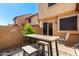 Enclosed patio with outdoor seating and access to the home's interior at 7977 W Wacker Rd # 171, Peoria, AZ 85381