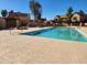 Community pool and surrounding patio for relaxing and enjoying the summer weather at 7977 W Wacker Rd # 171, Peoria, AZ 85381