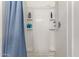 Tiled shower stall with built-in shelving and essential toiletries at 7977 W Wacker Rd # 171, Peoria, AZ 85381