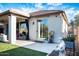 Outdoor patio with sliding doors and lush green lawn, perfect for entertaining at 808 E Constance Way, Phoenix, AZ 85042