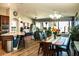 Beautiful open dining room featuring wood floors, large windows, and stylish decor at 808 E Constance Way, Phoenix, AZ 85042