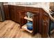 Kitchen cabinetry with pull out shelving at 808 E Constance Way, Phoenix, AZ 85042