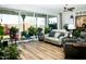 Bright living room with hardwood floors and sliding glass doors leading to the backyard at 808 E Constance Way, Phoenix, AZ 85042