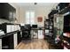 Well-lit home office with multiple monitors and ample storage space at 808 E Constance Way, Phoenix, AZ 85042