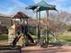 Community playground features a climbing structure and slide, with a shaded canopy at 808 E Constance Way, Phoenix, AZ 85042