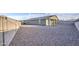 Large, low-maintenance backyard with ample space and a covered patio area at 8420 S 69Th Ln, Laveen, AZ 85339