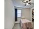 Bedroom with carpeted floors, ceiling fan, and a window with curtains at 8420 S 69Th Ln, Laveen, AZ 85339