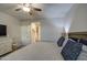 Comfortable bedroom with a stylish bed, side tables, and an inviting ambiance at 8420 S 69Th Ln, Laveen, AZ 85339