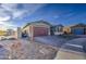 Attractive single-story home with desert landscaping, a two-car garage, and a view at 8420 S 69Th Ln, Laveen, AZ 85339