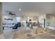 Bright, open-concept living and dining space with modern décor and a well-equipped kitchen at 8420 S 69Th Ln, Laveen, AZ 85339