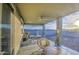 Inviting covered patio with ceiling fan, stylish seating, and mountain views, perfect for outdoor relaxation at 8420 S 69Th Ln, Laveen, AZ 85339