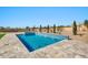 Sparkling backyard pool and spa with desert landscaping, perfect for relaxation and entertaining at 8730 E Tether Trl, Scottsdale, AZ 85255