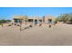 Stunning modern home featuring desert landscaping and a welcoming facade, with a neutral color palette at 8730 E Tether Trl, Scottsdale, AZ 85255