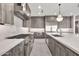 A chef's dream kitchen, featuring a spacious island, professional appliances, and modern cabinetry at 8730 E Tether Trl, Scottsdale, AZ 85255