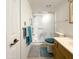 Bathroom featuring a shower and tub combination with safety bars and updated fixtures at 10330 W Thunderbird Blvd # C128, Sun City, AZ 85351