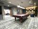 Inviting game room featuring a pool table and comfortable seating area at 10330 W Thunderbird Blvd # C128, Sun City, AZ 85351