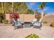 Cozy outdoor patio with comfortable seating, perfect for gatherings and relaxation at 10490 E Dreyfus E Ave, Scottsdale, AZ 85260