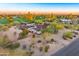 Expansive view of the property with lush landscaping, a nearby golf course, and desert foliage at 11801 N Sundown Dr, Scottsdale, AZ 85260