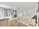 Bright bedroom with a ceiling fan, a cozy bed, and a view of the backyard at 11801 N Sundown Dr, Scottsdale, AZ 85260
