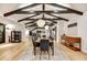 Dining room with light wood floors, statement lighting, and an open-concept design at 11801 N Sundown Dr, Scottsdale, AZ 85260