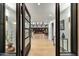 Spacious entryway with light wood floors and views of the open floor plan at 11801 N Sundown Dr, Scottsdale, AZ 85260
