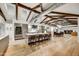 Open kitchen with island seating, modern appliances, and beautiful wood floors at 11801 N Sundown Dr, Scottsdale, AZ 85260