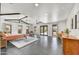 Bright main bedroom features exposed beam ceiling, tile floor, and multiple door leading to outdoor living at 11801 N Sundown Dr, Scottsdale, AZ 85260