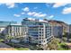 Aerial shot of the complex and neighboring office buildings, set against a beautiful, sunny skyscape at 120 E Rio Salado Pkwy # 101, Tempe, AZ 85281