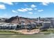 Beautiful aerial view of modern buildings with mountain backdrop on a bright day at 120 E Rio Salado Pkwy # 101, Tempe, AZ 85281