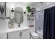Charming bathroom featuring a modern vanity, unique mirror, and stylish fixtures at 120 E Rio Salado Pkwy # 101, Tempe, AZ 85281