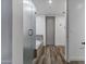This bathroom offers a bathtub with shower and wood look flooring at 120 E Rio Salado Pkwy # 101, Tempe, AZ 85281