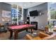 Upscale game room features a pool table, comfortable seating, and flat screen television at 120 E Rio Salado Pkwy # 101, Tempe, AZ 85281