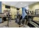 Well-equipped gym features a variety of exercise machines and mirrored walls at 120 E Rio Salado Pkwy # 101, Tempe, AZ 85281