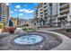 A bubbly outdoor hot tub surrounded by stone pavers, set against a beautiful, sunny skyscape and lounge seating at 120 E Rio Salado Pkwy # 101, Tempe, AZ 85281