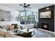 Stylish living room with fireplace, large windows, and comfortable seating at 120 E Rio Salado Pkwy # 101, Tempe, AZ 85281