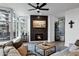 Cozy living room features fireplace, large windows, and comfortable seating at 120 E Rio Salado Pkwy # 101, Tempe, AZ 85281