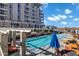Stunning pool with lounge chairs, umbrellas, and views of the surrounding community at 120 E Rio Salado Pkwy # 101, Tempe, AZ 85281