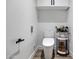 Contemporary powder room with modern toilet, stylish fixtures, and elegant decor at 120 E Rio Salado Pkwy # 101, Tempe, AZ 85281