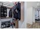 Well-organized walk-in closet with shelving and rods for optimal storage and access to a bedroom at 120 E Rio Salado Pkwy # 101, Tempe, AZ 85281