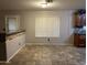 Dining area with tile flooring and bar-height counter at 12733 W Boca Raton Rd, El Mirage, AZ 85335