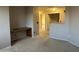 Upstairs loft area with built-in desk and neutral carpet at 12733 W Boca Raton Rd, El Mirage, AZ 85335