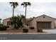 Charming single-story home with a well-manicured landscape and two-car garage at 13417 W La Vina Dr, Sun City West, AZ 85375