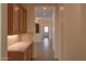 Neutral hallway leading to the home's entrance at 13417 W La Vina Dr, Sun City West, AZ 85375