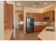 Gourmet kitchen with stainless steel appliances and abundant cabinet space at 13417 W La Vina Dr, Sun City West, AZ 85375
