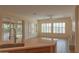 Bright living room with plenty of natural light flowing from the kitchen at 13417 W La Vina Dr, Sun City West, AZ 85375